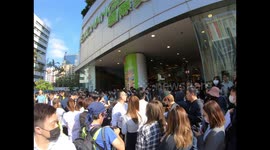 Office workers avoid riot police on 'Lunch With You' protest in Hong Kong