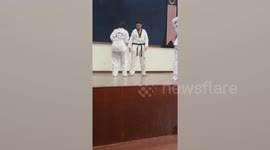 Teenage girl takes out taekwondo black belt with accidental kick in his groin