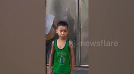 Filipino boys trick their friend with coin game