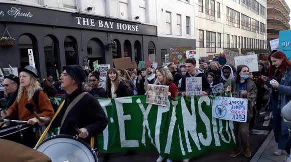 Thousands of people turnout for Earth Strike Protest in Bristol city centre against Black Friday consumerism and climate change