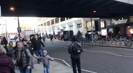 Crowds of people flee after 'man shot' on London Bridge