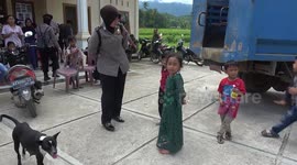 Eliminate Trauma, Children of Disaster Invited by Indonesian Women Police sing together.