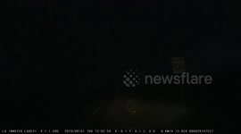 Lightning strike near car