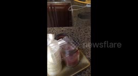 Using smoke to relight a candle