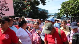 Disabled veterans march in El Salvador on International Day of Persons with Disabilities