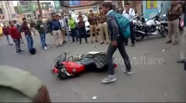 Heavy traffic fine sends biker into meltdown blocking road in India