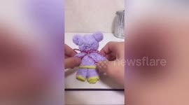 Talented woman transforms towel into miniature toy bear in China