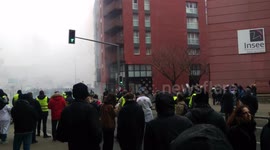 People march against Macron