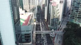 Drone footage shows thousands marching in Hong Kong