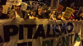 protesters march in Madrid demanding measures to curb climate change