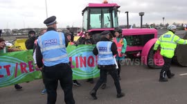 Climate change activists block road outside Heathrow Airport to demonstrate against third runway
