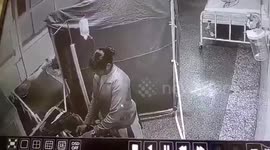 Shocking moment hospital staff steals $365 from 80-year-old patient's bag in central India