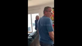 Dad denied wanting a puppy gets surprised with one for Christmas. Has the most unexpected, genuine and heartfelt reaction.
