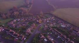 Britain's darkest village with no street lights becomes illuminated for Christmas after a couple decorate their old tree which grew to 52ft after planting it in 1978