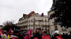 Crowd cheers as inhabitants unveil giant banner