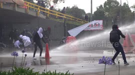 Colombian riot police use water cannon as protest turns violent