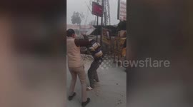 Eve-teaser gets sound thrashing from lady cop for harassing girls in northern India