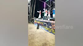 Stray dog transfixed by coyote dancers after gatecrashing country show