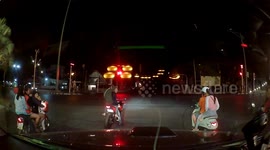 Thai boys trying to show off motorcycle skills end up falling on their backsides