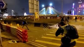 Hong Kong 12th December 2019 - Riot police remove road barricades during a peaceful 'United We Stand' rally in Central, Hong Kong