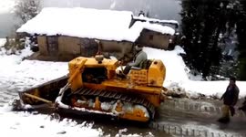 Snow clearing process in Northern India.