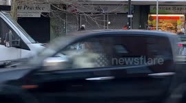 MAN HELPS HIMSELF TO CHARITY SHOP DONATIONS.
