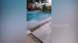 Swimming pool shakes violently during Philippines earthquake