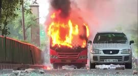 Protesters in Delhi torch buses and clash with police over citizenship bill