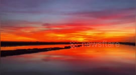 Footage showcases stunning sunset in Beijing