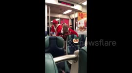 Shocking moment man dressed as Santa STABBED on NYC subway by 'old, drunk, homophobic' man