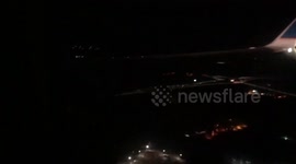 United Flight landing after flames come from engine