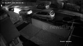 Car crashing into car and hedge