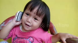 Even though the language is unclear, toddler still has the confidence to call convincingly