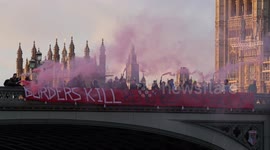 'Borders Kill' banner dropped from Westminster Bridge in remembrance of 39 Essex lorry victims