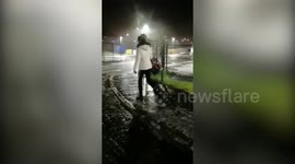 Hilarious moment a mum repeatedly slipped over on black ice - and then couldn't get up