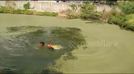 Hero passerby jumps into pond to rescue drowning woman in southern India