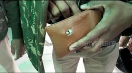 Cop had a narrow escape after a bullet fired at him stuck in his wallet