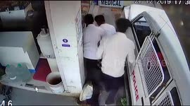 Close kale! Vegetable vendor inches from death when runaway police car grazes her leg