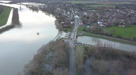 Flood causes road closure Cambridgeshire Christmas traffic disruption