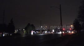Energy efficient LED street light starts flashing and putting on a cool light show like it was set to music in Markham near Toronto