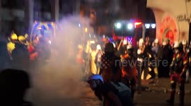 Newsflare Edit - The chilean police attacked with teargas the fireman's and lifesavers