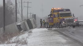 Some snow in southern Ontario implies some accidents in southern Ontario and today was no exception in Hamilton west of Toronto where this truck flipped onto it's side on highway 6
