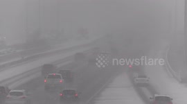 Brief periods of heavy snow near Toronto made for poor visibiliy for drivers at times today