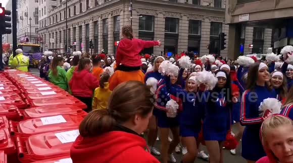 London New Year's Parade held in Piccadilly with costumes, dinosaurs and giant balloons