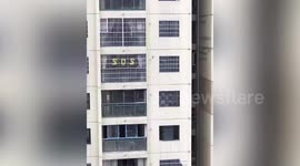 Chinese resident mistakes New Year balloons spelling '2020' for 'SOS' sign after zero-shaped balloon becomes unusable