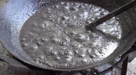 Sinister bubbling cauldron is actually full of delicious Thai caramel sweets