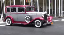 Rare gorgeous beautiful classic car makes it's way down Broadway in New York City
