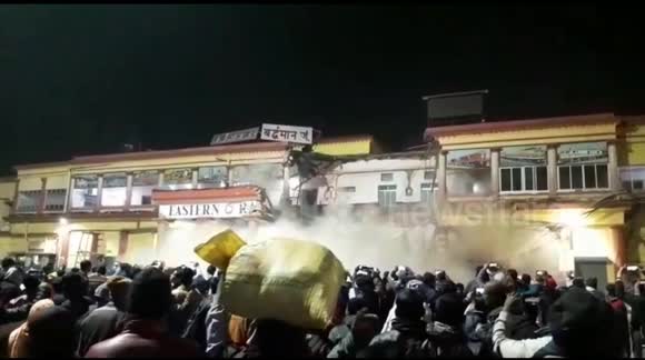 Crowded train station entrance collapses in east India