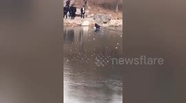 University student manages to swim back to shore on his own after falling into frozen lake in China
