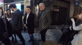 Stephen Fry tries to sneak past photogs at Magic Gone Wrong in London